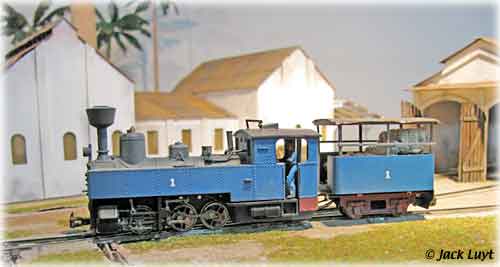 Loco #1 in front of mill buildings.